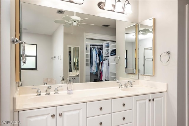 bathroom with vanity and ceiling fan