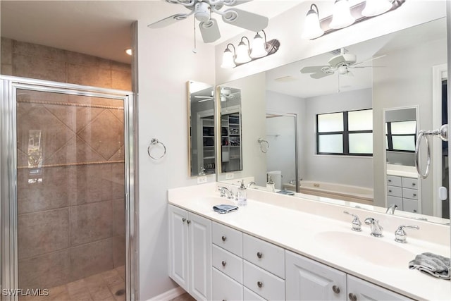 bathroom with independent shower and bath, vanity, and ceiling fan