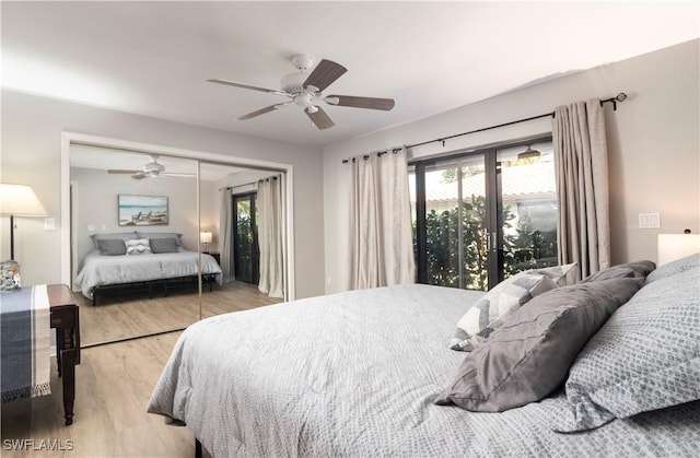 bedroom featuring a closet, ceiling fan, and light wood-type flooring