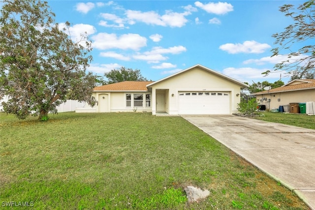 view of front facade featuring a garage and a front yard