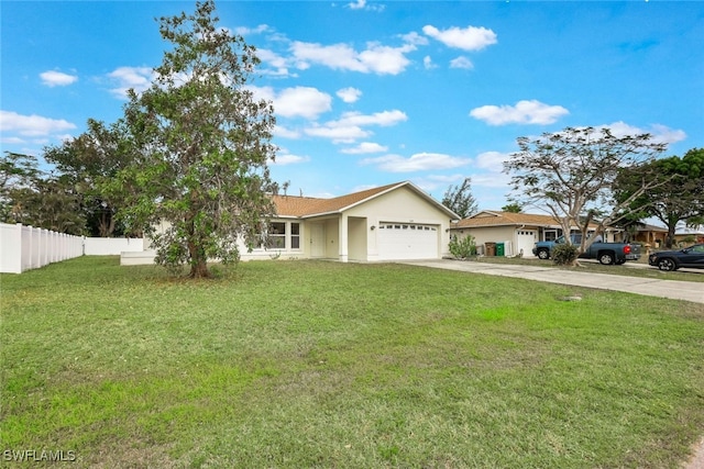 ranch-style home with a front lawn and a garage