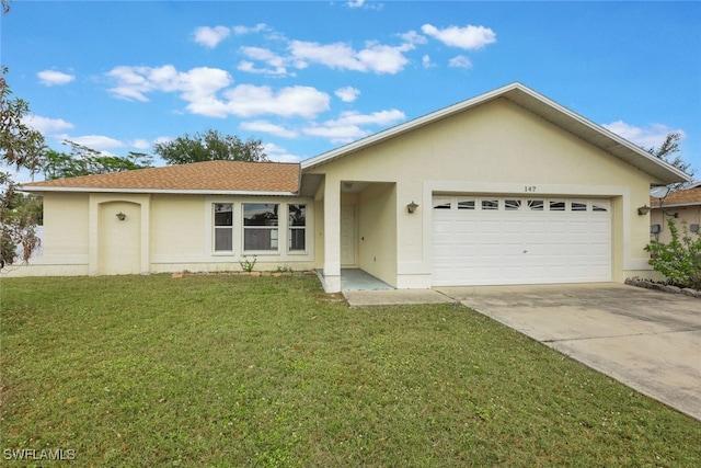 ranch-style home with a garage and a front yard