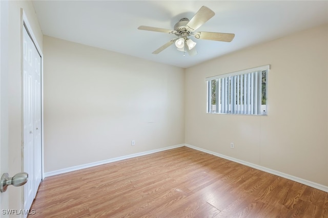 empty room featuring light hardwood / wood-style floors and ceiling fan