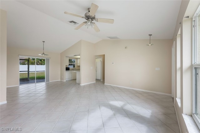 unfurnished living room featuring vaulted ceiling, ceiling fan, and light tile patterned floors