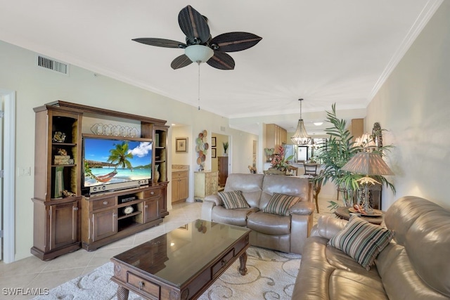 tiled living room with ornamental molding and ceiling fan with notable chandelier