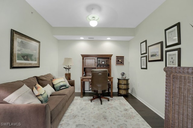 office space with dark hardwood / wood-style floors