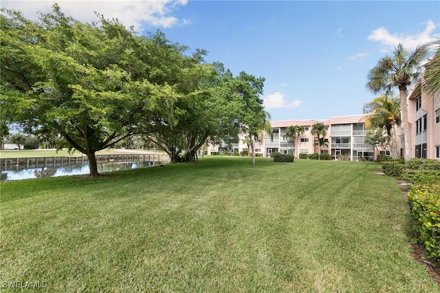 view of yard with a water view