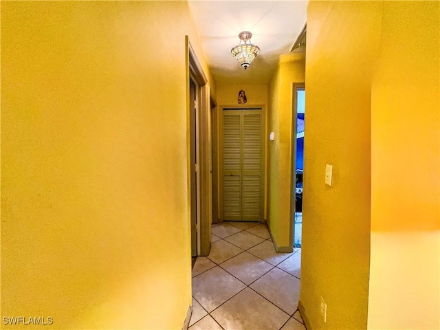 hallway with light tile patterned flooring