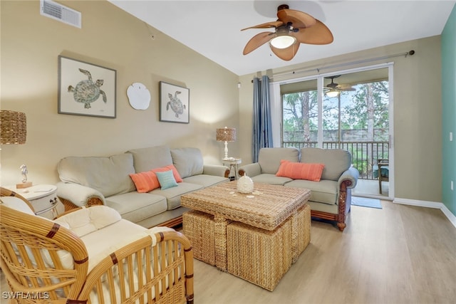 living room with ceiling fan and light hardwood / wood-style floors