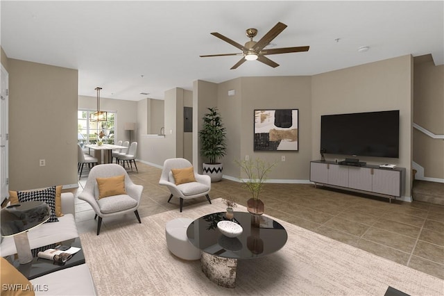 living room featuring tile patterned floors and ceiling fan