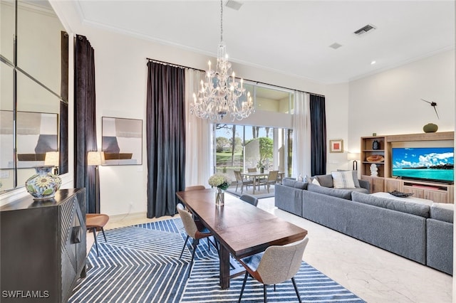 dining area featuring ornamental molding and a chandelier