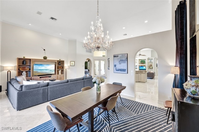 dining space with crown molding