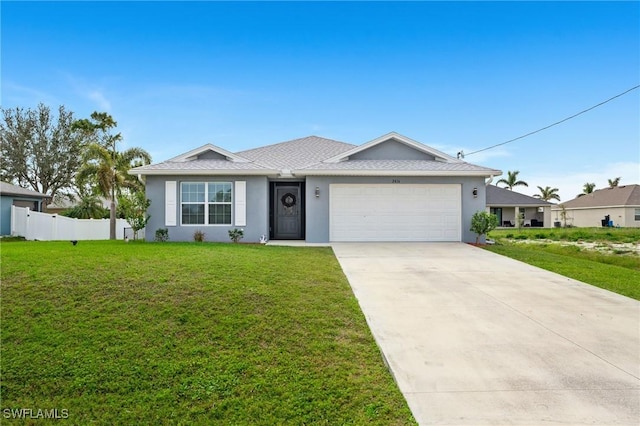 ranch-style house featuring a front yard, driveway, an attached garage, and fence