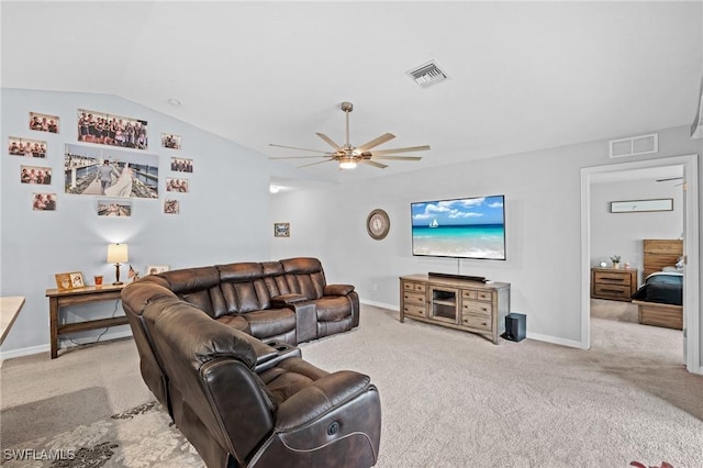 living room featuring light carpet, ceiling fan, visible vents, and lofted ceiling