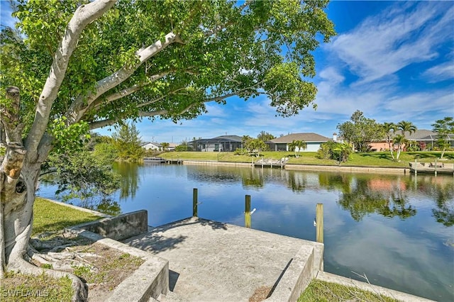 dock area featuring a water view