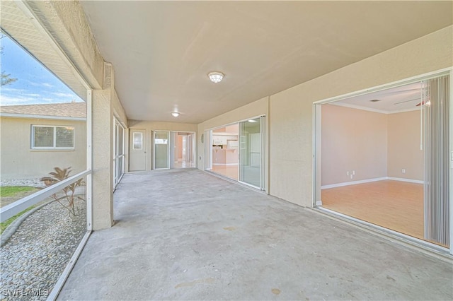 unfurnished sunroom featuring plenty of natural light