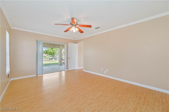 spare room with crown molding, ceiling fan, and light hardwood / wood-style flooring