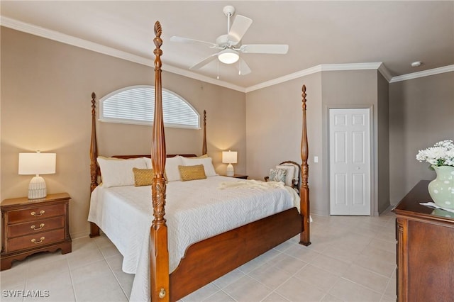 tiled bedroom with ornamental molding and ceiling fan