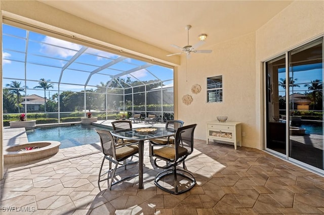 view of patio / terrace featuring a lanai