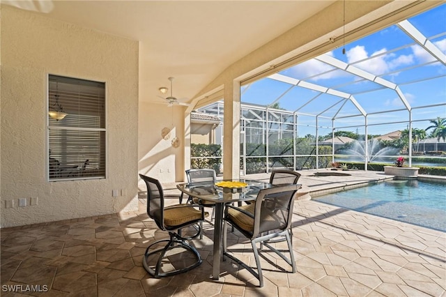 view of patio with glass enclosure