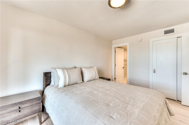 bedroom featuring light hardwood / wood-style floors