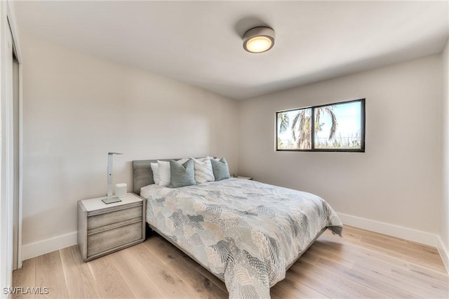 bedroom featuring light hardwood / wood-style flooring