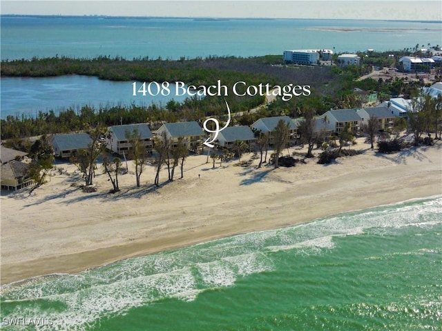 aerial view featuring a beach view and a water view