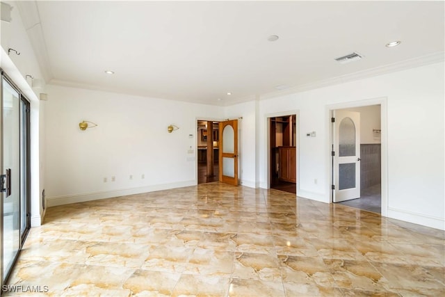 unfurnished room featuring ornamental molding