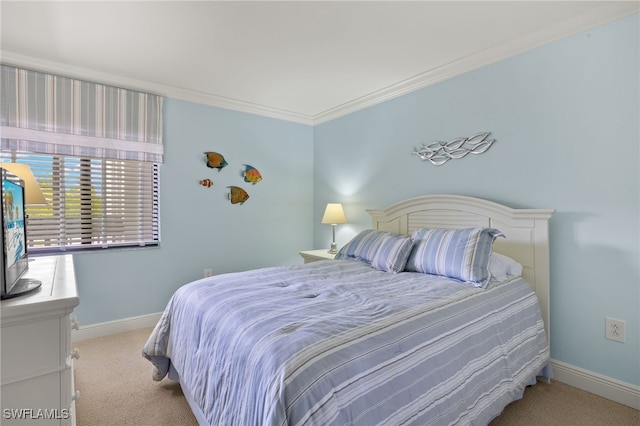 carpeted bedroom featuring ornamental molding