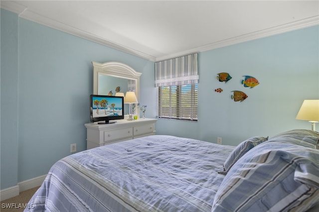 carpeted bedroom with crown molding