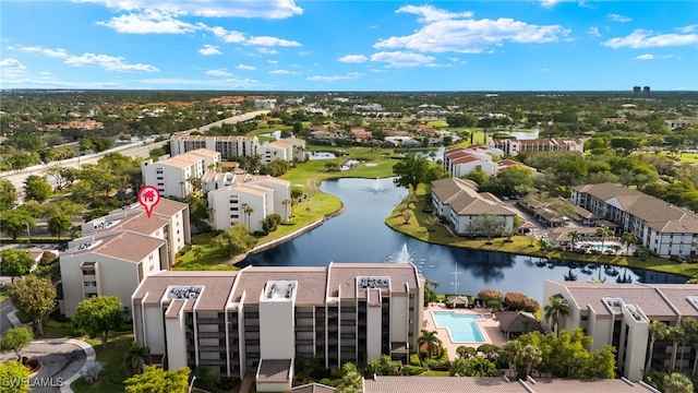 birds eye view of property featuring a water view