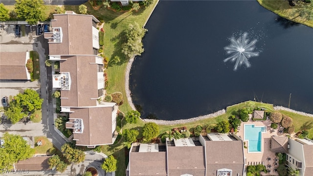 drone / aerial view with a water view