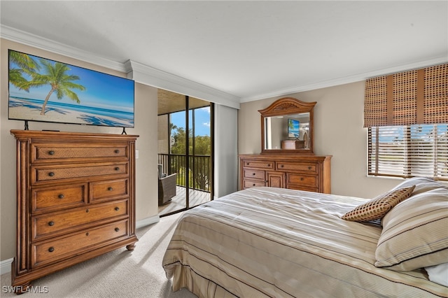 carpeted bedroom with crown molding and access to outside