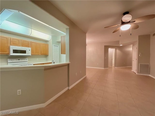 kitchen with ceiling fan, white appliances, light brown cabinetry, and light tile patterned flooring