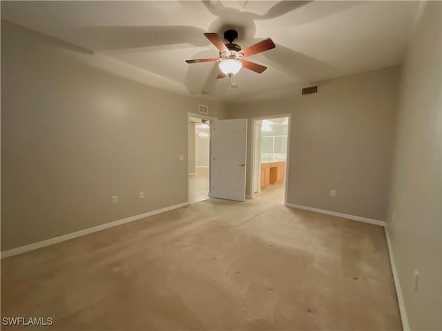 empty room with light colored carpet