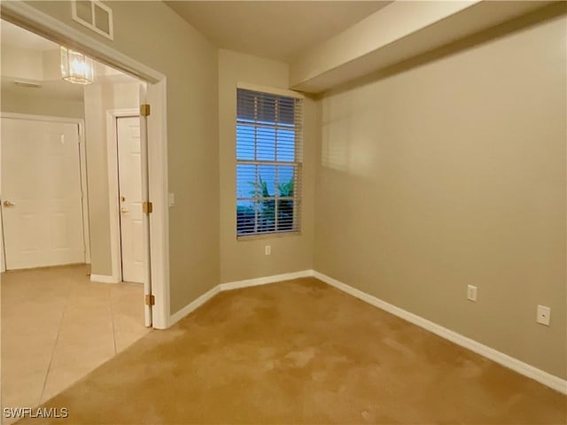 view of tiled spare room