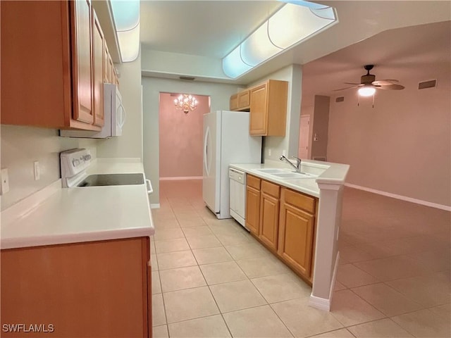 kitchen with white appliances, sink, kitchen peninsula, ceiling fan with notable chandelier, and light tile patterned flooring