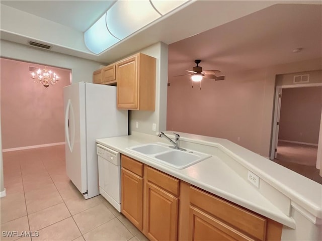 kitchen featuring ceiling fan with notable chandelier, dishwasher, light brown cabinets, sink, and light tile patterned floors