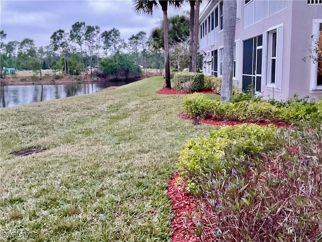 view of yard featuring a water view