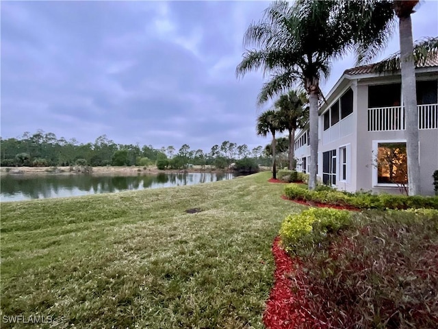 view of yard with a water view