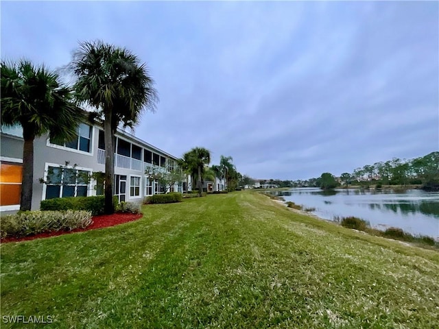 exterior space with a water view