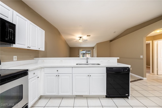 kitchen with black appliances, white cabinetry, light tile patterned floors, and sink