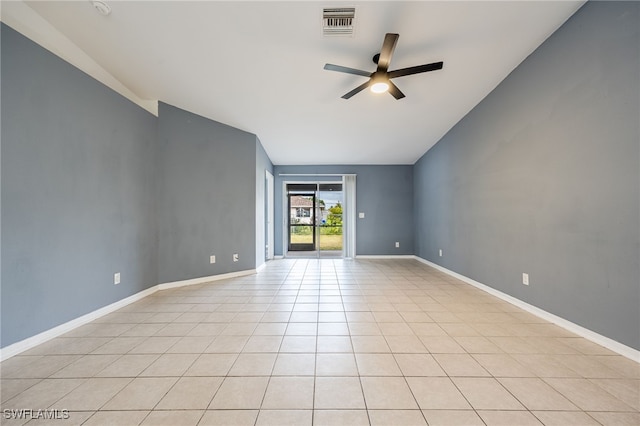 spare room with light tile patterned flooring and ceiling fan