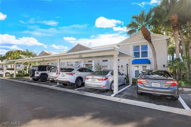 view of front of home with a carport