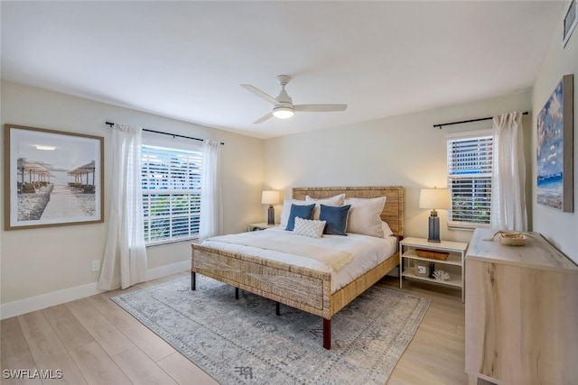 bedroom featuring ceiling fan and light wood-type flooring