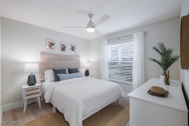 bedroom featuring ceiling fan and light hardwood / wood-style flooring