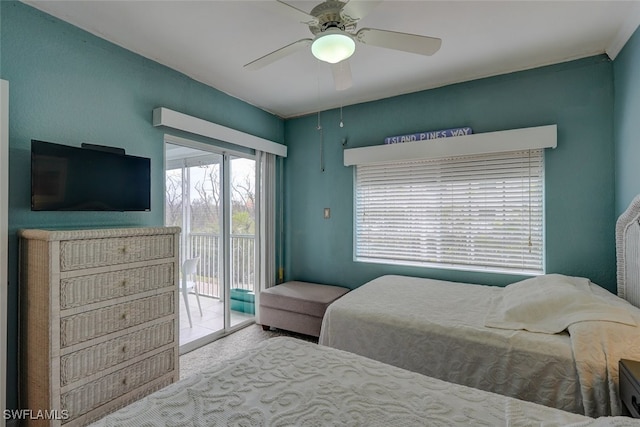 bedroom with access to exterior and ceiling fan