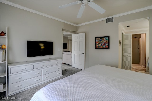 carpeted bedroom featuring crown molding and ceiling fan