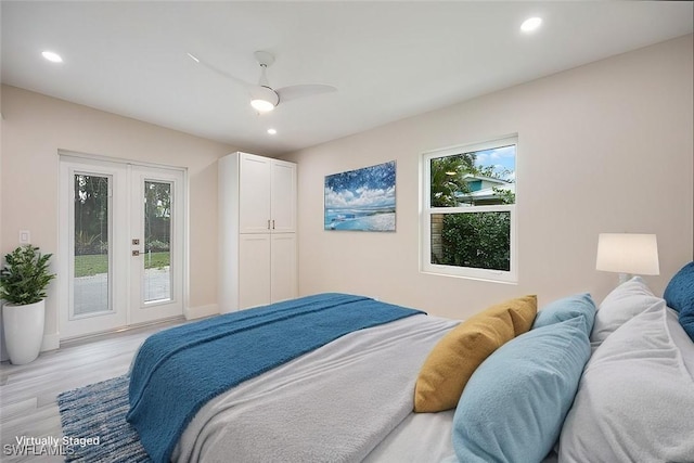 bedroom with ceiling fan, french doors, light wood-type flooring, and recessed lighting