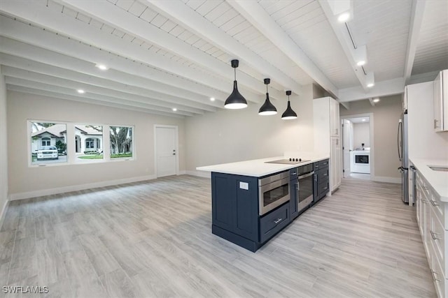 kitchen featuring light countertops, wall oven, white cabinets, baseboards, and black electric cooktop